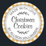 Rustic Homemade Christmas Cookies Yellow Check Classic Round Sticker<br><div class="desc">Rustic, modern and simple homemade baked goods apple pie sticker with the text made with love, Christmas cookies and your name in elegant handwritten script calligraphy and typography on a mellow yellow check pattern background with a stylish touch of foliage. Simply add your name and the product name to the...</div>