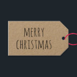 Rustic Kraft Merry Christmas | Holiday Minimalist Gift Tags<br><div class="desc">Bring a rustic and cosy touch to your holiday gifts with this Merry Christmas gift tag on a kraft paper. The natural texture and handwritten font create a warm, handmade feel that pairs beautifully with twine, greenery, or simple wrapping. Perfect for Christmas presents, stocking stuffers, party favours, and rustic holiday...</div>