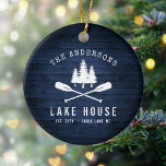 Rustic Lake House Boat Oars Trees Blue Wood Print Ceramic Tree Decoration<br><div class="desc">A beautiful, rustic themed ceramic ornament, featuring your family name and "Lake House" or other desired text along with its established date and location. This custom, unique design features a white silhouette of crossed boat oars and pine trees on a print of wood planks in rich blue colours. A charming...</div>