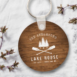 Rustic Lake House Oars Trees Wood Print Round Key Ring<br><div class="desc">A beautiful, rustic themed round keychain, featuring your family name and "Lake House" or other desired text along with its established date and location. This custom, unique design features a white silhouette of crossed boat oars and pine trees on a print of wood planks. To see more designs like this,...</div>