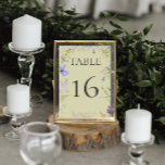 Rustic Lavender & Sage Wildflowers Sage Wedding Table Number<br><div class="desc">Introducing our exquisite rustic wedding program, crafted to capture the essence of your special day with its enchanting design. Picture a soft sage green backdrop, setting a serene and romantic tone for your celebration. The design is adorned with a delicate frame of ethereal wildflowers in shades of purple, lavender, cream,...</div>