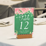 Rustic lights blush pink peonies green wedding table number<br><div class="desc">Rustic wedding table number with editable text featuring rustic shimmering lights and big rose pink peony flowers on fern green barn wood background. Ideal for your spring summer | autumn fall | garden | elegant rustic country | outdoor backyard themed wedding.</div>