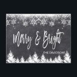 Rustic Merry and Bright Chalkboard Typography Announcement Postcard<br><div class="desc">Elegant design featuring an elegant,  modern "Merry and Bright" typography,  on a chalkboard background with snowflakes and trees. Use Customise tool to add your info,  message. More ideas in my Christmas Photo Collection.</div>
