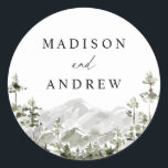 Rustic Mountain Evergreen Forest Wedding Classic Round Sticker<br><div class="desc">Rustic wedding stickers featuring a landscape of watercolor evergreen trees and mountains. Personalise the woodland mountain wedding stickers with your names and wedding details. The woodland wedding stickers are perfect for sealing wedding envelopes, wedding favour bags, and more! The forest wedding invitations are perfect for destination weddings in the mountains....</div>