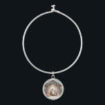 Rustic Nativity Scene with Winter Florals Bangle Bracelet<br><div class="desc">This serene nativity scene captures the peaceful beauty of the Holy Family beneath a rustic wooden stable, gently lit by lanterns and surrounded by soft snowfall. The design features Mary, Joseph, and baby Jesus in a warm, reverent moment, accentuated by delicate winter florals, snow-covered pine branches, and glowing string lights....</div>