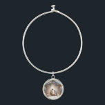Rustic Nativity Scene with Winter Florals Bangle Bracelet<br><div class="desc">This serene nativity scene captures the peaceful beauty of the Holy Family beneath a rustic wooden stable, gently lit by lanterns and surrounded by soft snowfall. The design features Mary, Joseph, and baby Jesus in a warm, reverent moment, accentuated by delicate winter florals, snow-covered pine branches, and glowing string lights....</div>