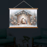 Rustic Nativity Scene with Winter Florals Hanging Tapestry<br><div class="desc">This serene nativity scene captures the peaceful beauty of the Holy Family beneath a rustic wooden stable, gently lit by lanterns and surrounded by soft snowfall. The design features Mary, Joseph, and baby Jesus in a warm, reverent moment, accentuated by delicate winter florals, snow-covered pine branches, and glowing string lights....</div>
