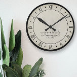 Rustic Paper 1st Wedding Anniversary Wall Clock<br><div class="desc">Celebrate your first wedding anniversary with a rustic parchment paper clock with roman numerals. Just add your names and wedding date and hang it on your wall.</div>