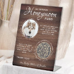 Rustic Pet Wedding Custom Dog Photo Honeymoon Fund Pedestal Sign<br><div class="desc">Let your best dog be in charge of your honeymoon with this custom pet photo honeymoon fund sign. Perfect for dog lovers, and a dog honeymoon fund will be a hit at your wedding. Rustic country wood with black botanical eucalyptus leaves. "My Parents Honeymoon Fund" Customise this pet wedding honeymoon...</div>