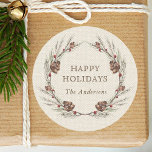 Rustic Pinecone Wreath Christmas Holiday Classic Round Sticker<br><div class="desc">Send holiday cheer to your family and friends. This design features watercolor pine corns and  red berries on a faux burlap canvas texture background. For more advanced customisation of this design,  Please click the "Customise" button. Matching items are also available.</div>