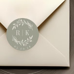 Rustic Sage Botanical Wreath Wedding Monogram Classic Round Sticker<br><div class="desc">Custom-designed botanical wedding monogram stickers featuring elegant white beige wreath with couple's initials and wedding date on sage colour background. Perfect for wedding save the dates,  envelops,  wedding favour packagings and more.</div>