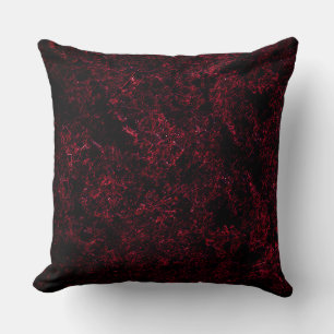 Rustic spongy red on dark background cushion
