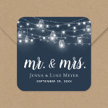 Rustic String Lights Mr. and Mrs. Wedding Monogram Square Sticker<br><div class="desc">Custom printed stickers personalised with your Mr. and Mrs. monogram and wedding date, perfect for wedding favour labels, welcome bags or envelope seals with your invitations. The design features glowing string lights and mason jars on a navy blue background. Use the design tools to choose any background colour, change the...</div>