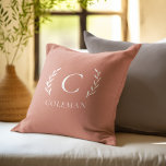 Rustic Terracotta Monogram Initial Indoor Outdoor Cushion<br><div class="desc">This rustic design showcases a monogrammed initial at the heart of a leafy branch motif set against a beautiful terracotta backdrop. The chic and elegant foliage pattern is ideal for enhancing the decor of your bedroom, family room, living room, porch or patio. Customise this classic farmhouse pillow with your family's...</div>