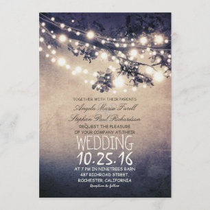 Rustic tree branches & string lights wedding invitation