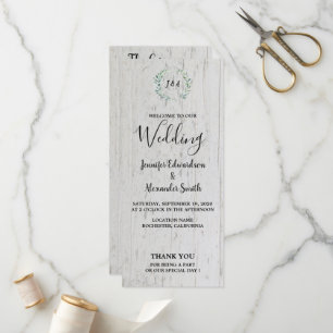 Rustic watercolor leaves on barn wood wedding programme