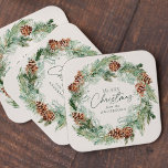 Rustic Watercolor Pine Cone Wreath Merry Christmas Square Paper Coaster<br><div class="desc">Elegant holiday paper coasters featuring a watercolor wreath of pine cones, pine boughs, and lush greenery with a light cream background. "Merry Christmas" is displayed in a dark green script with your name shown below. The rustic Christmas paper coasters are perfect to use for holiday parties, Christmas dinners, and other...</div>