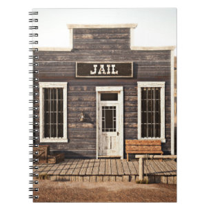 Rustic western town jail. 3d ing. Part of a wester Notebook
