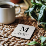 Rustic White Washed Wood Custom Monogram Initial Coaster<br><div class="desc">This simply elegant custom monogrammed beverage coaster set features classic black monogram text that can be personalised with a last name initial and last name. A beautiful keepsake gift for a newlywed couple, family, or new homeowners. A white washed faux wood grain background adds a rustic textured look to the...</div>