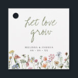 Rustic Wildflowers Let Love Grow Wedding Seeds  Favour Tags<br><div class="desc">Pretty favour tags for your seeds packet favours,  featuring the editable headline "let love grow" in sage green handwritten style font,  and a border of watercolor wildflowers in pink,  blue,  lilac,  yellow and white. The reverse features the same  border of flowers and an editable message.</div>