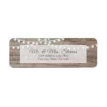 Rustic wood and string lights return address