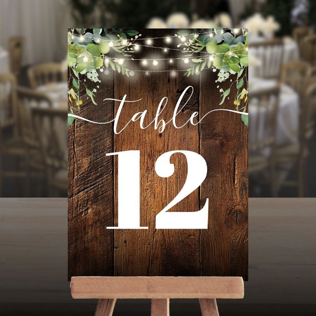 Rustic Wood String Lights Greenery Table Number (Creator Uploaded)