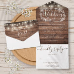 Rustic Wood String Lights Script Floral Wedding All In One Invitation<br><div class="desc">All in one wedding invitation featuring pretty string lights,  hand-drawn floral garland and chic typography on a  rustic wood panels background. The invitation includes a perforated RSVP card that can be individually addressed or left blank for you to handwrite your guest's address details. Designed by Thisisnotme©</div>