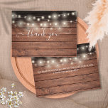 Rustic Wood String Lights Script Wedding Thank You Card<br><div class="desc">An elegant script thank you card featuring pretty string lights on a rustic wood background. You can personalize with your own thank you message on the reverse or if you would prefer to add your own handwritten message simply delete the text. A perfect way to say thank you! Designed by...</div>