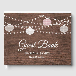 Rustic wood string lights wedding guest book