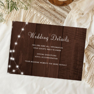 Rustic wood string lights wedding guest details enclosure card