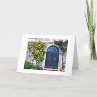 RUSTIC WOODEN DOOR WITH YELLOW AND RED ROSES
