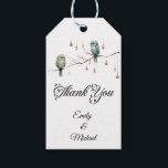 Rustic Woodland Love Birds  Romantic Wedding  Gift Tags<br><div class="desc">This charming image features two delicate birds perched on a bare branch, surrounded by hanging glass lights that look like vintage lanterns. The soft hues of green and blue in the birds' feathers and the minimalist background give the design a whimsical and rustic feel. The lights add a warm, magical...</div>