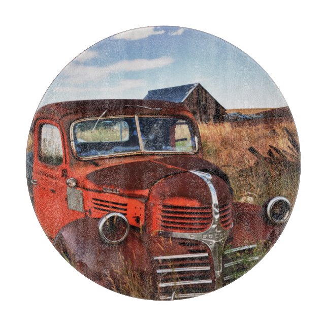 Rusting orange Dodge truck with abandoned farm Cutting Board (Front)