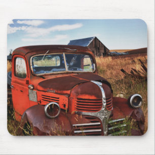 Rusting orange Dodge truck with abandoned farm Mouse Pad