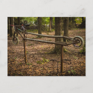 Rusty Bicycle Frame Sculpture in the Woods Postcard