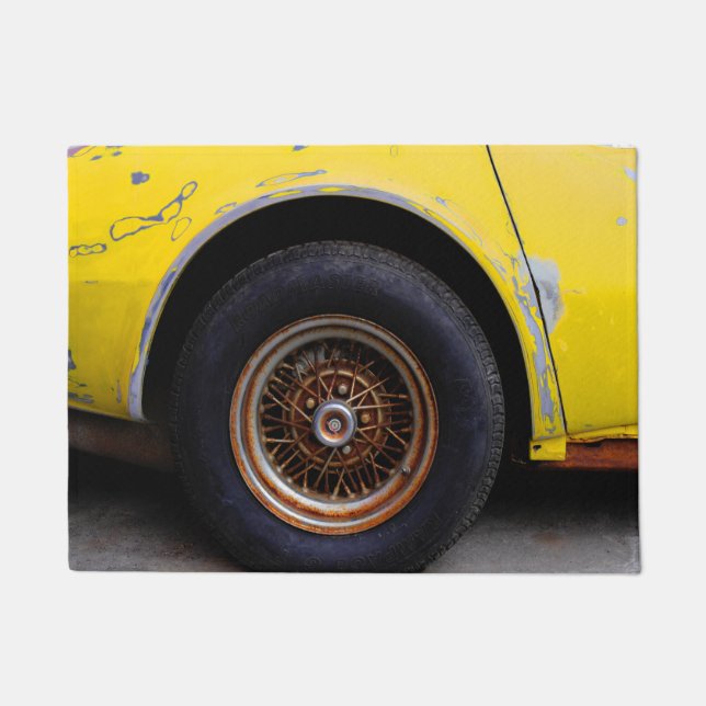 Rusty Roadmaster Tire, Peeling Yellow Painted Car Doormat (Front)
