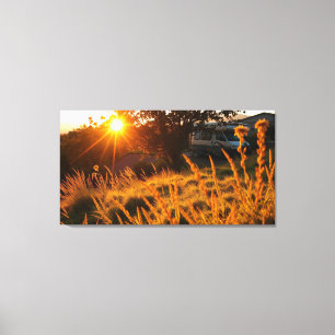 RV in a field Canvas Print