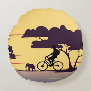 Safari Bike Ride at Sunset – Cyclist and Elephant  Round Cushion