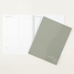 Sage Green Elegant Simple Minimalist Personalised Planner<br><div class="desc">Sage Green Elegant Simple Minimalist Personalised Notebook featuring your name and year in modern script. Our planner is here to help you achieve your goals. It provides a way to stay organised and reflect on your life. With a simple undated design, you can use this planner for any occasion: from...</div>