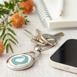 Sage green heart dragon on white key ring
