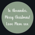 Sage Green Merry Christmas from Mum gift tag<br><div class="desc">Sage green Christmas gift tag sticker with the message, "To Alexander, Merry Christmas! Love Mum xxx" in white typography/ script. To personalise, simply add your name in the personalise this text box. You can also add your own name in the love from section, or change the holiday message. If you...</div>