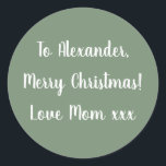 Sage Green Merry Christmas from Mum gift tag<br><div class="desc">Sage green Christmas gift tag sticker with the message, "To Alexander, Merry Christmas! Love Mum xxx" in white typography/ script. To personalise, simply add your name in the personalise this text box. You can also add your own name in the love from section, or change the holiday message. If you...</div>
