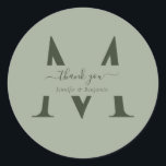Sage Green Monogram Wedding Favour Thank You Classic Round Sticker<br><div class="desc">Modern personalised sage green monogram wedding thank you stickers with modern script. Easily personalise online. Matching items available to complement these elegant monogram wedding labels.</div>