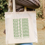 Sage Green Retro Boho Personalised Maid of Honour Tote Bag<br><div class="desc">Are you planning a bachelorette party but don't know what to bring? Check out our personalised sage green maid of honour bachelorette party group tote bags! These totes are perfect for carrying all of your belongings to and from the wedding. We can personalise them with any name, monogram and special...</div>