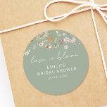 Sage Green Wildflower Bridal Shower Love In Bloom Classic Round Sticker<br><div class="desc">Express gratitude with our Wildflower Thank You Bridal Shower In Bloom Classic Round Sticker. These charming stickers feature a delightful wildflower design, infusing a touch of natural beauty into your bridal shower thank-you notes or favours. The classic round shape adds versatility, making them perfect for various uses, from sealing envelopes...</div>