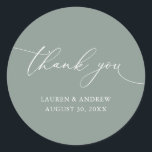 Sage Olive Green Minimalist Wedding Thank You Classic Round Sticker<br><div class="desc">Our modern minimalist thank you sticker/seal has "thank you" written in modern calligraphy script and can be fully customised with your name,  dates and background colour.</div>