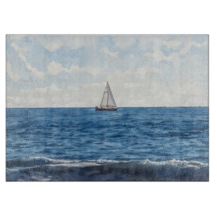 Sailboat Sailing on the Ocean Blue Glass Cutting Board