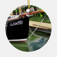 Sailboat with Bow Sprit and Reflections in Water