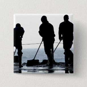 Sailors sweep out the hangar bay 15 cm square badge