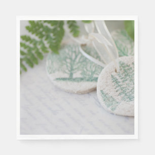 Salt dough tree ornaments on vintage letters napkin